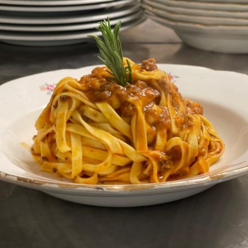 Tagliatelle di pasta fresca al ragu' di cinghiale